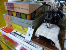 TWO BOXED VULCAN CHILD'S SEWING MACHINES AND A WOODEN MICKI TRAIN SET.