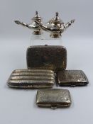 A PAIR OF VICTORIAN SILVER PLATED TABLE CIGAR LIGHTERS TOGETHER WITH A FOUR DIVISION SILVER CIGAR