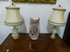 A PINK TO WHITE BOHEMIAN OVERLAID GLASS LUSTRE WITH POLYCHROME FLORAL DECORATION HUNG WITH PRISMS.