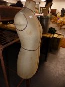 AN ANTIQUE DRESSMAKER'S FORM.