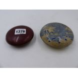 A CHINESE LIVER GLAZE ROUND COVERED BOX. Dia. 8cms. TOGETHER WITH ANOTHER WITH BLUE LANDSCAPE