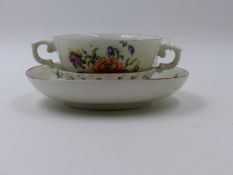 A DERBY PORCELAIN TREMBLEUSE CUP AND SAUCER.