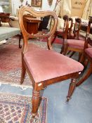 A SET OF SIX VICTORIAN ROSEWOOD DINING CHAIRS ON TURNED AND OCTAGONAL FORM LEGS TOGETHER WITH A