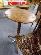 AN EARLY 19th.C.YEW WOOD TILT TOP LAMP TABLE ON TRIPOD SUPPORTS.