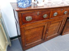 A LARGE GEORGIAN COUNTRY OAK WELSH DRESSER OF FOUR DRAWERS OVER CUPBOARD BASE. W.230 x H.90cms.