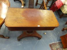 A MID VICTORIAN MAHOGANY FOLD OVER TEA TABLE ON OCTAGONAL COLUMN AND PLATFORM BASE. W.101cms.