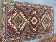 A CAUCASIAN RUG. 208 x 135cms.