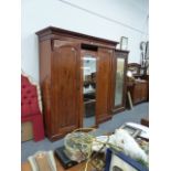 A LARGE VICTORIAN MAHOGANY COMPACTUM WARDROBE.