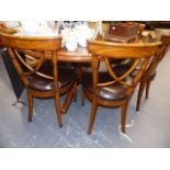 A GOOD QUALITY PARQUETRY TOP DINING TABLE AND FOUR MATCHING CHAIRS.