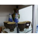 A SET OF FOUR SAKI CUPS AND ORIENTAL WARE.