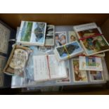 A BOX OF CIGARETTE CARDS.