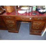 AN EDWARDIAN MAHOGANY PEDESTAL DESK.