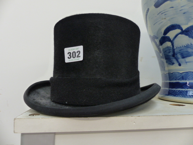 A YOUNG'S OF ENGLAND TOP HAT.