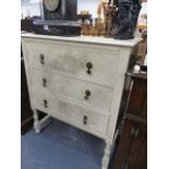 A PAINTED CHEST OF DRAWERS.