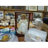 A CASED DOLL, THREE BISQUE FIGURINES, VARIOUS CHINAWARE,ETC.