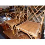 A PAIR OF BAMBOO CHAIRS.