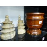 A PAIR OF CARVED SOAPSTONE TEMPLE BOOKENDS AND A WOODEN MORTAR.