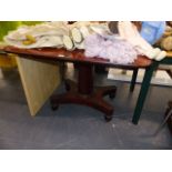 A VICTORIAN MAHOGANY FOLD OVER TEA TABLE.