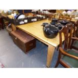 A LARGE ANTIQUE PINE KITCHEN TABLE.