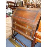 A SMALL OAK BUREAU.