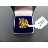 AN 18ct GOLD AND DIAMOND 1970'S DRESS RING.