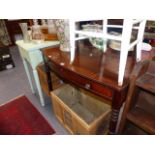 A LATE GEORGIAN MAHOGANY BOW FRONT SIDE TABLE.