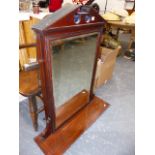 A LARGE MAHOGANY MIRROR.