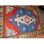 A HAND WOVEN EASTERN RUG.