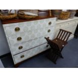 A DECOUPAGE DECORATED ANTIQUE CHEST OF DRAWERS.