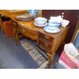 A WALNUT DRESSING TABLE.