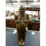 A BRONZE FIGURINE OF WINSTON CHURCHILL.