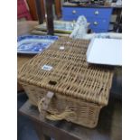 A SMALL PICNIC HAMPER.