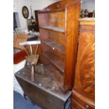 AN OAK BARLEY TWIST GATELEG TABLE AND A SMALL BOOKCASE.