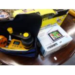 A LASER LEVEL, A MINIATURE TV AND A GOOD QUALITY PROTIMETER GRAINMASTER TESTING DEVICE.