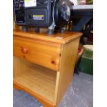 A PINE BEDSIDE CABINET.