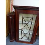 A MAHOGANY CORNER CABINET.