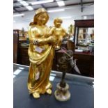 A CARVED GILTWOOD FIGURE OF THE MADONNA TOGETHER WITH A SMALL BRONZE FIGURE OF A PUTTO.