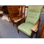 AN ARTS AND CRAFTS OAK ARMCHAIR AND A SIMILAR CARVED BACK CHAIR.