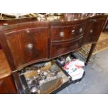 A MAHOGANY BOW FRONT SIDEBOARD.