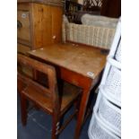 A CHILD'S DESK AND CHAIR,