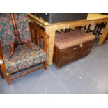 A BLANKET BOX AND AN OAK RECLINING ARMCHAIR.