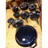 A QTY OF CAST IRON AGA COOKING PANS.
