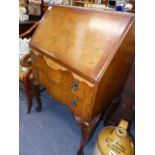 A QUEEN ANNE STYLE WALNUT BUREAU.