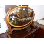 AN EDWARDIAN SWING MIRROR.