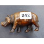 A SMALL SIGNED BRONZE HIPPO.