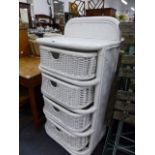 A RATTAN LAUNDRY CHEST.