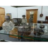 TWO SILVER HALLMARKED AND CUT GLASS SCENT BOTTLES TOGETHER WITH A CHESTER HALLMARK TRINKET BOX AND