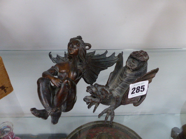 TWO BRONZED SCULPTURES, A DRAGON CROUCHING AND A WINGED SERPENT HEADED FIGURE.