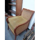 A BERGERE ARMCHAIR.