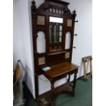 A VICTORIAN OAK HALLSTAND.